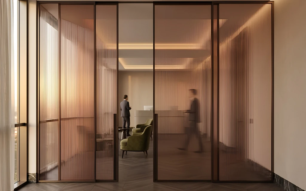 Modern architectural glass interior systems — bespoke partitions, sliding doors, and movable walls